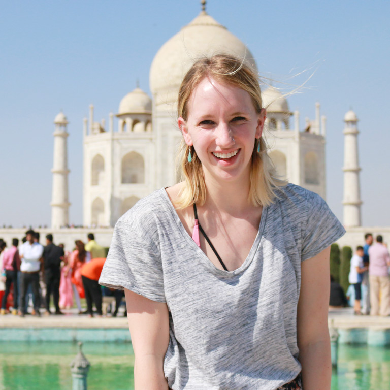 A student in front of the Taj Mahal